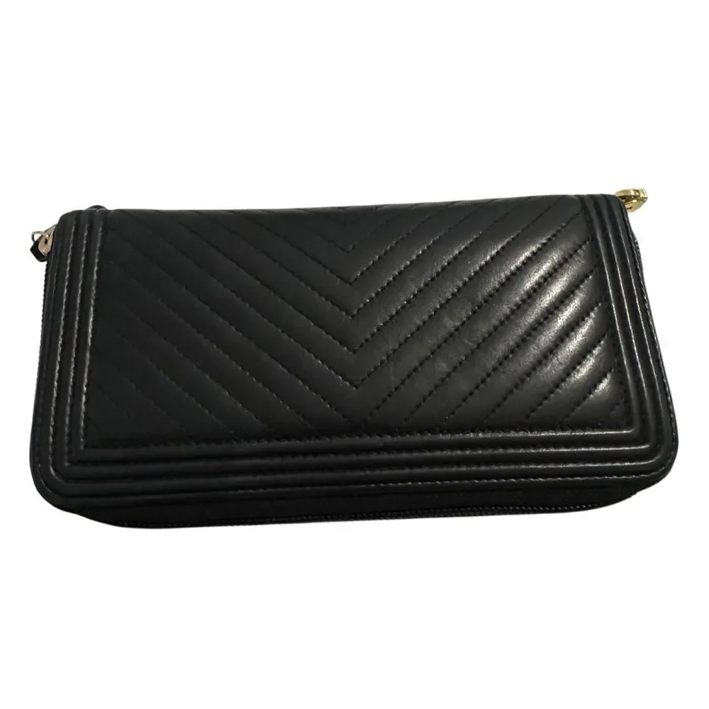 Chanel Black and Gold Quilted Clutch